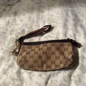 Authentic Gucci wristlet.
